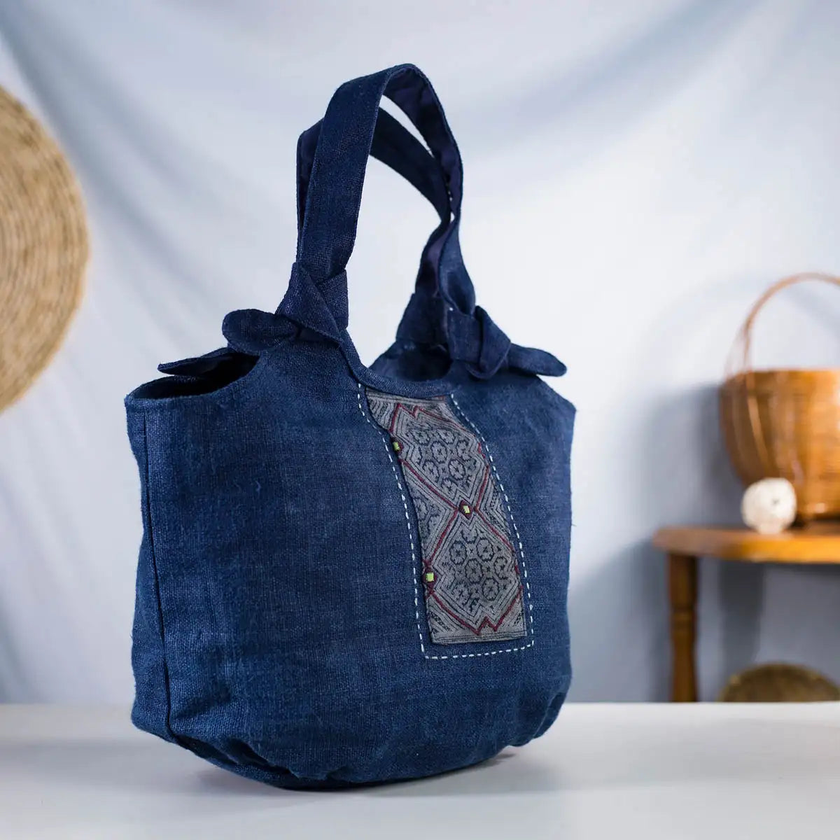 Handcrafted indigo hemp tote bag with H’mong patch, sustainable and stylish everyday bag.