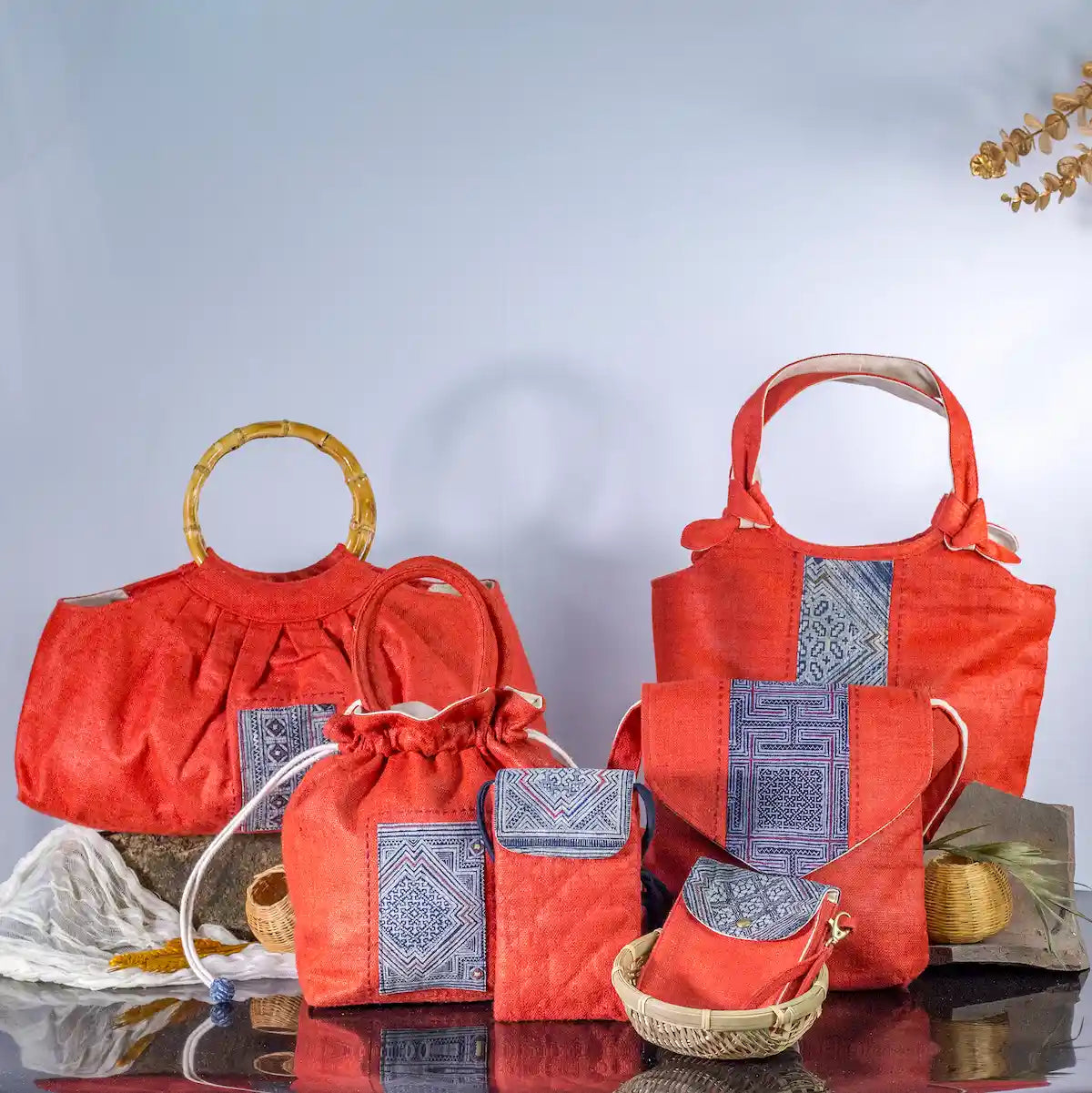 Set of red hemp handbags with bamboo handles and H’mong patches, handcrafted eco-friendly bags.