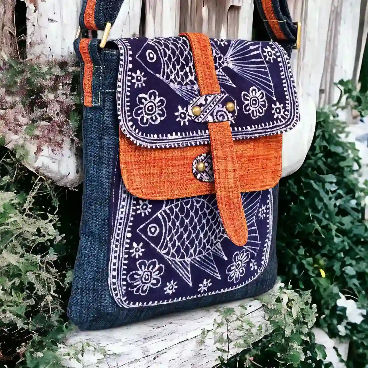 Vindigo crossbody bag denim embroidered with orange trim front close view