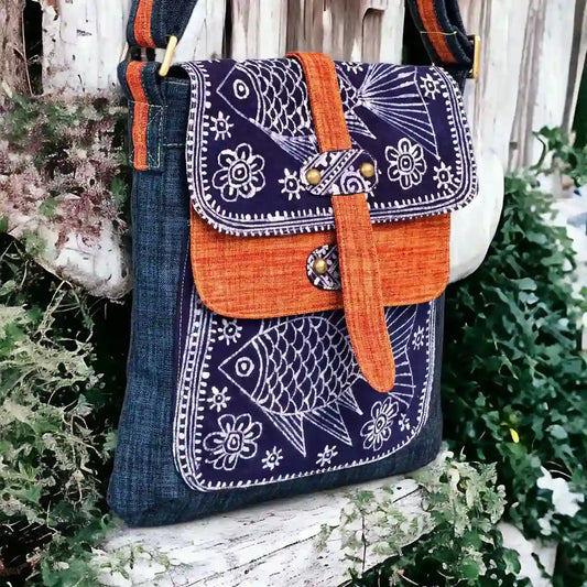 Vindigo crossbody bag denim embroidered with orange trim front close view