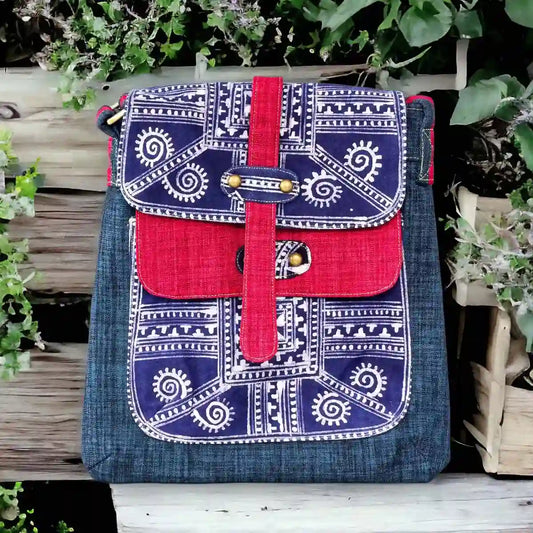 Vindigo crossbody bag denim embroidered with red trim front close view