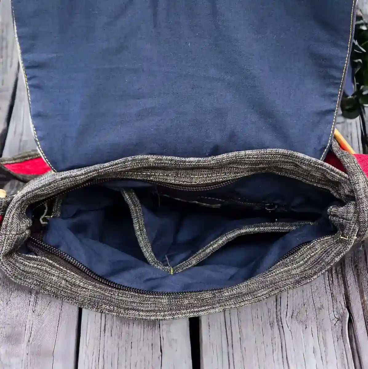 Vindigo crossbody bag grey embroidered with red accent inside detail view