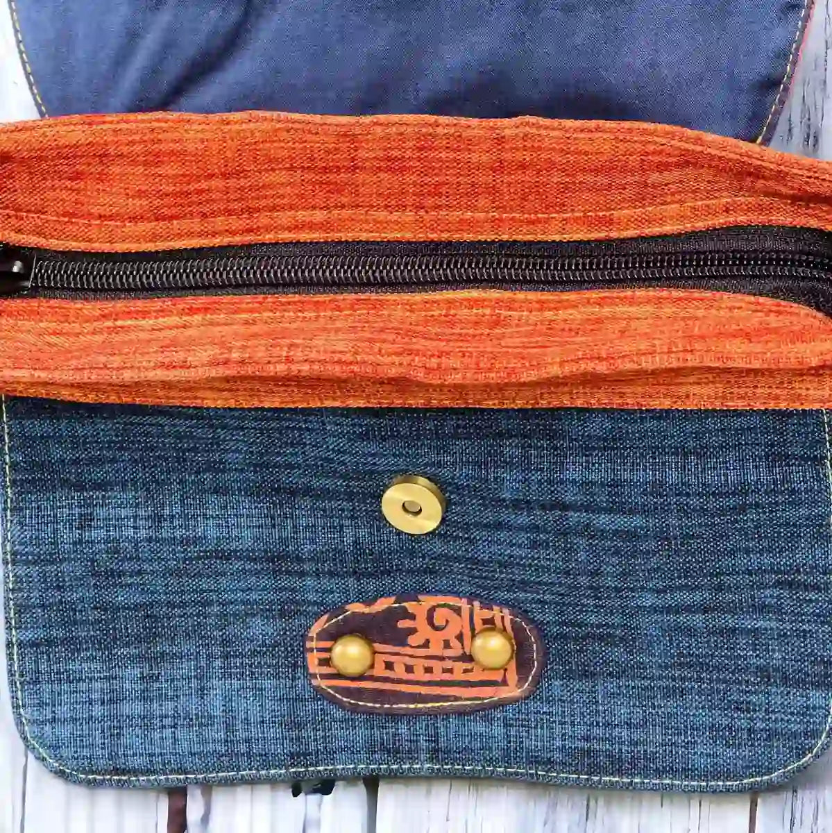 Vindigo crossbody bag orange embroidered with denim pocket detail view