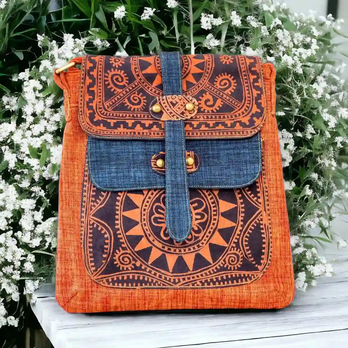 Vindigo crossbody bag orange embroidered with denim front close view