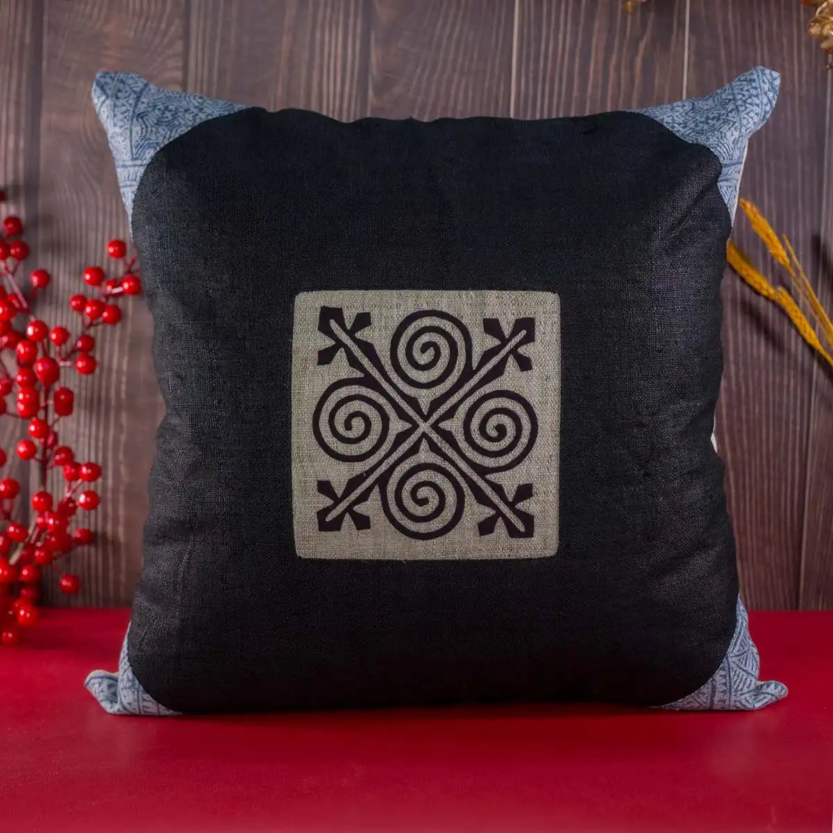 Vindigo cushion cover black embroidered spiral front angled view