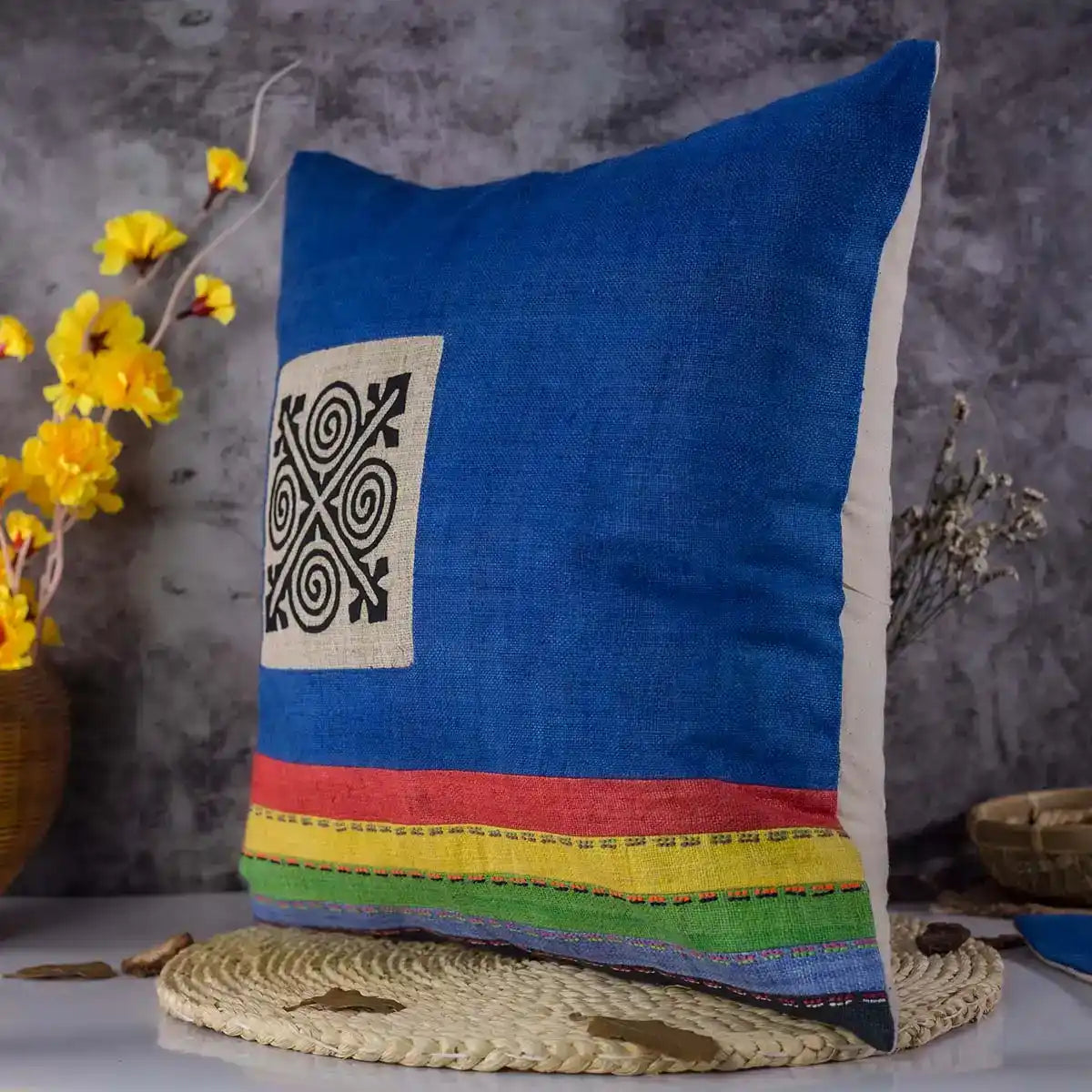 Vindigo cushion cover blue embroidered spiral side angled view