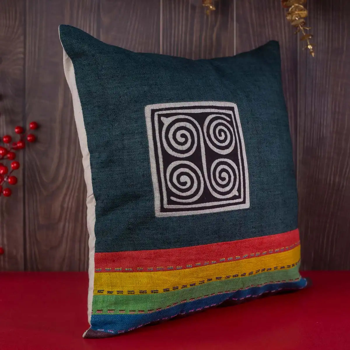 Vindigo cushion cover dark blue embroidered spiral side angled view