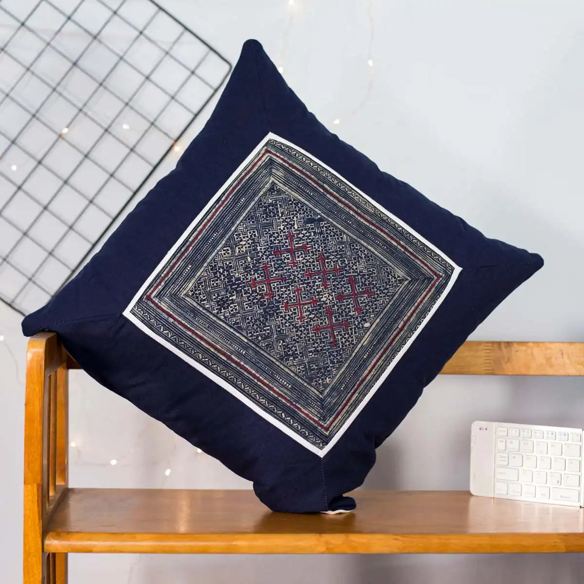 Vindigo cushion cover navy embroidered red center styled angle