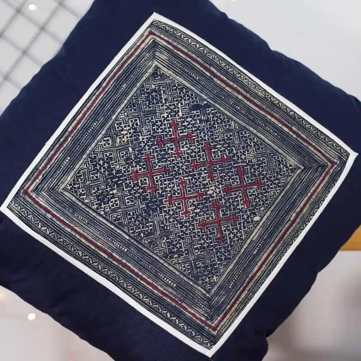 Vindigo cushion cover navy embroidered red center close detail