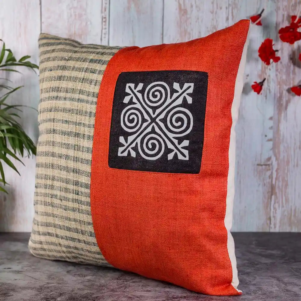 Vindigo cushion cover orange beige hemp spiral angled side view