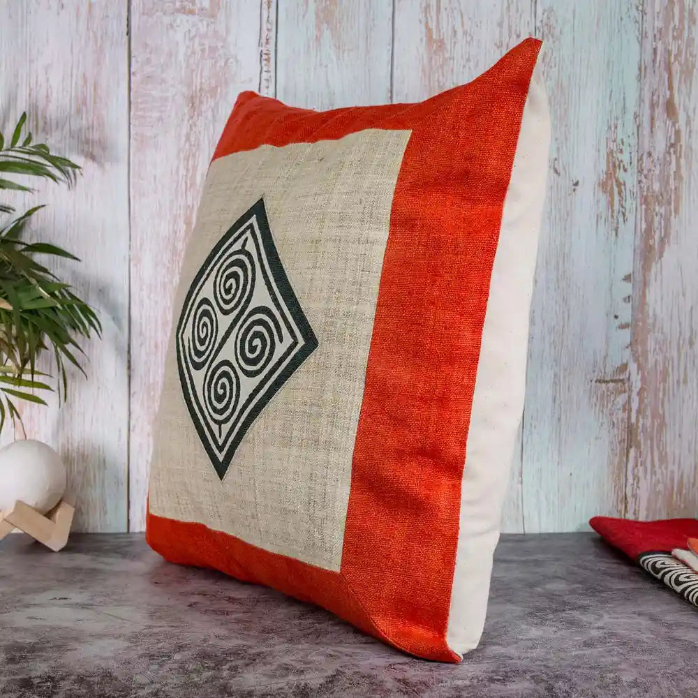 Vindigo cushion cover orange hemp spiral angled side view