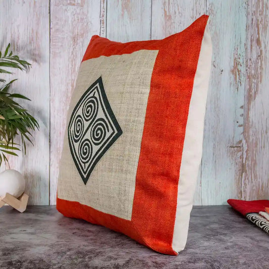 Vindigo cushion cover orange hemp spiral angled side view