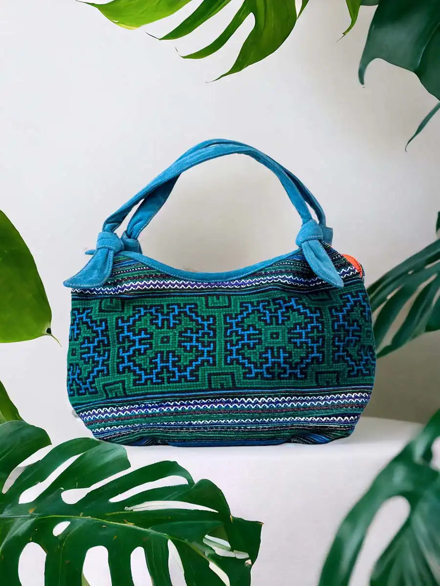 Vindigo handbag blue embroidered with orange lining back view