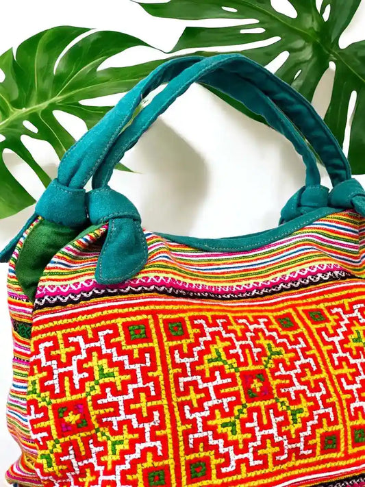 Vindigo handbag pewter brushed gold angled side view