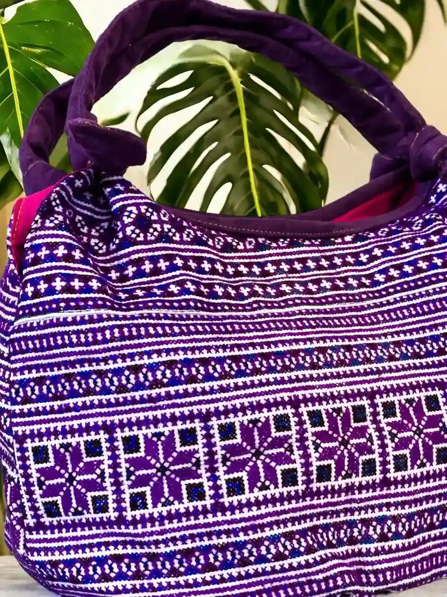 Vindigo handbag purple embroidered angled side view