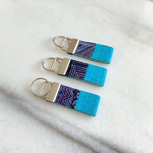 Vindigo keychain blue embroidered front view set of three