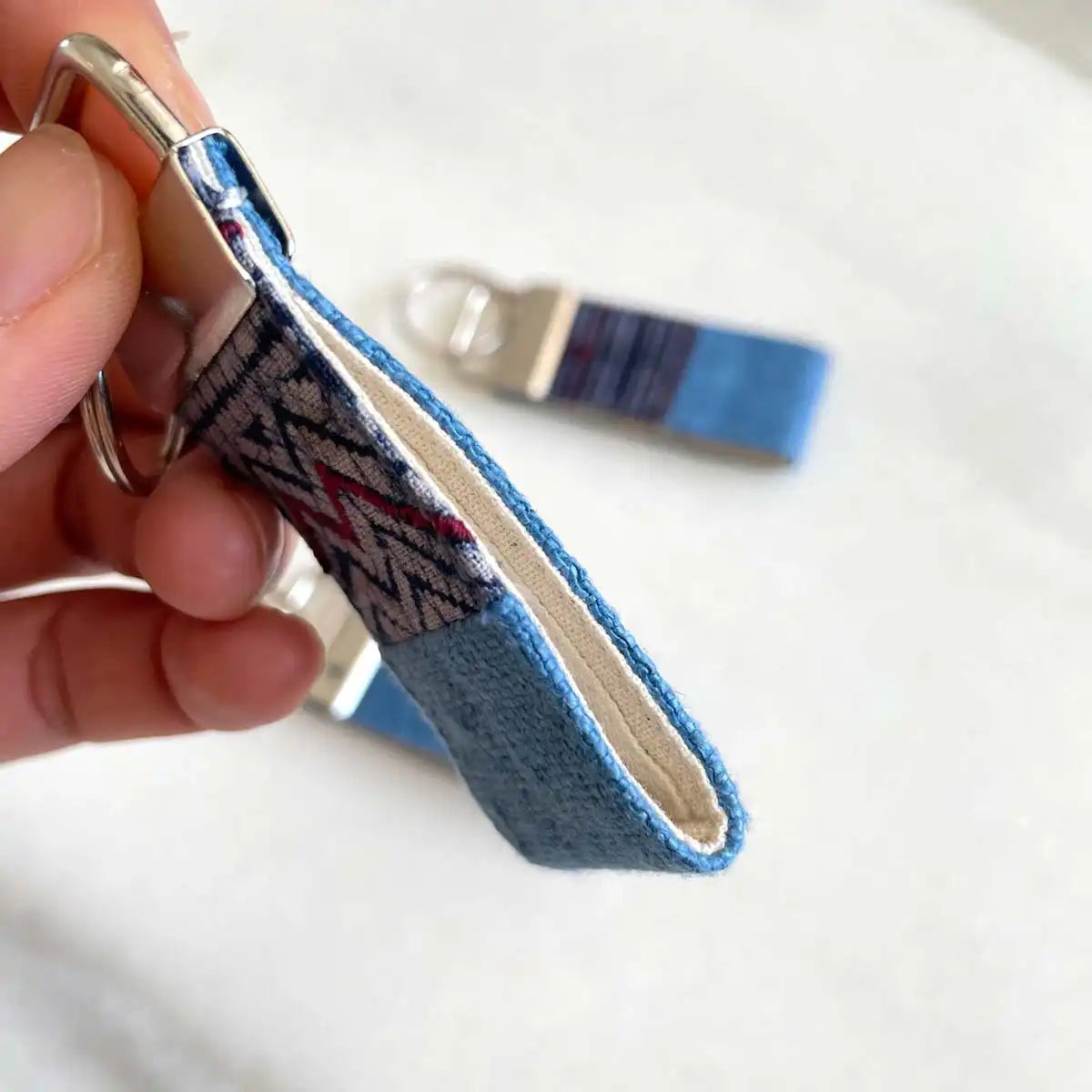 Vindigo keychain blue embroidered side thickness view