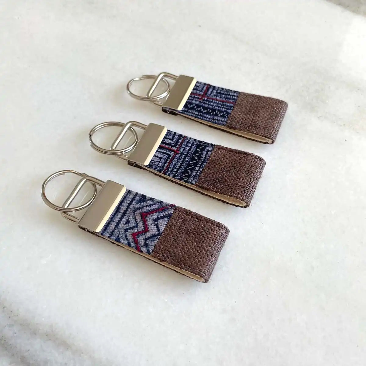 Vindigo keychain brown embroidered front view set of three