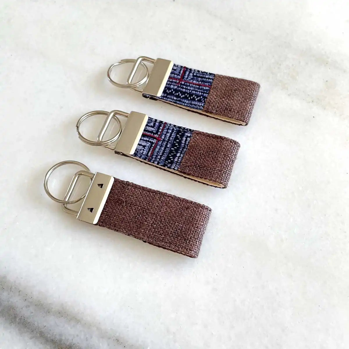 Vindigo keychain brown embroidered group front close view