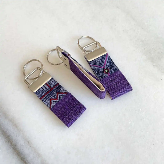 Vindigo keychain purple embroidered front angled view set of three