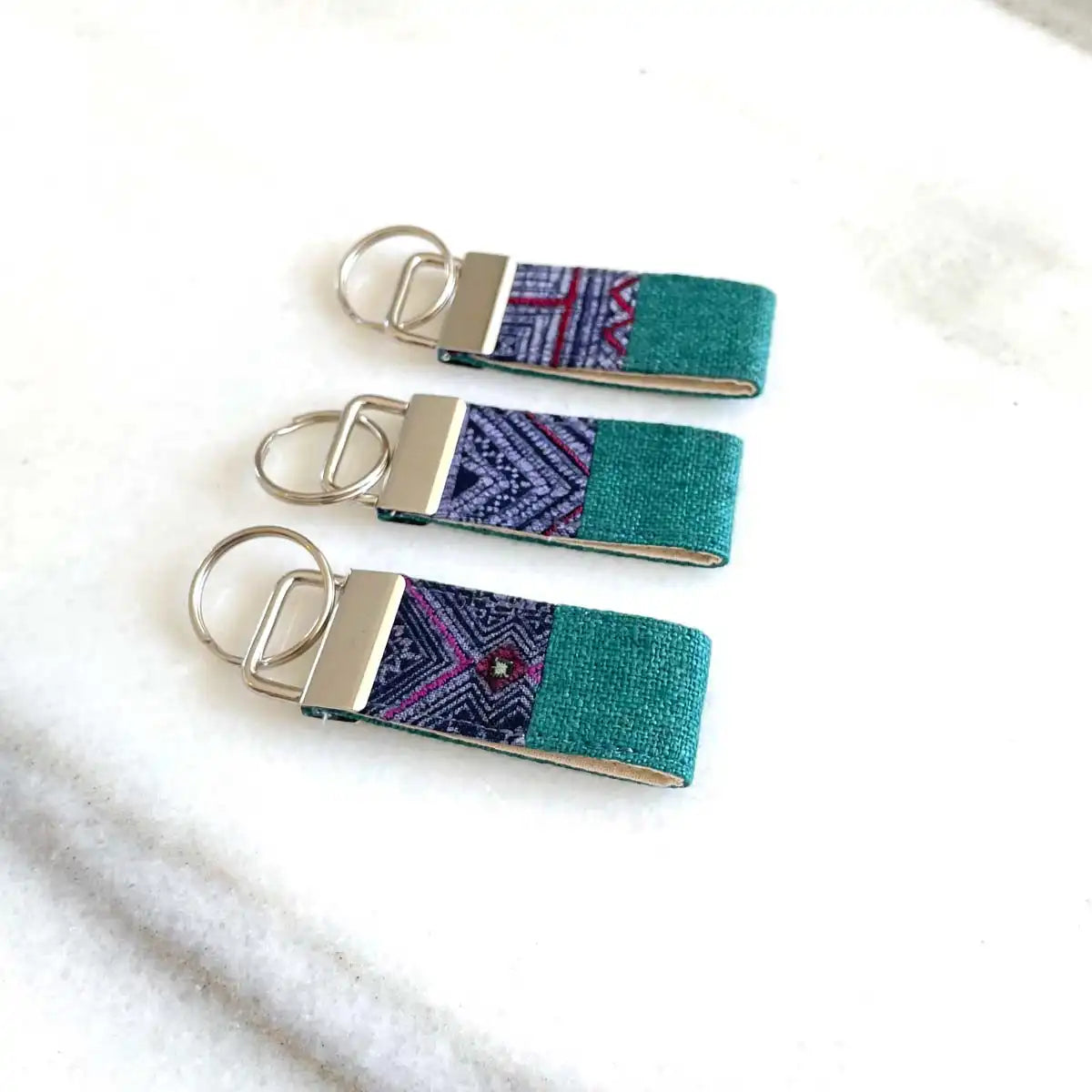 Vindigo keychain turquoise embroidered front view set of three
