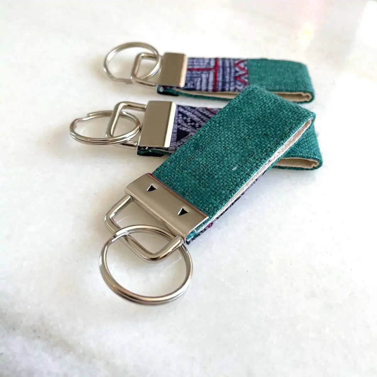 Vindigo keychain turquoise embroidered group display