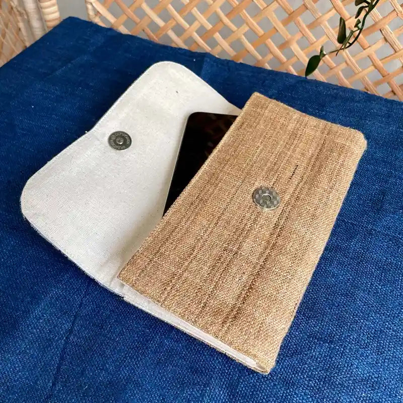 Vindigo long purse beige black embroidered lifestyle view with phone