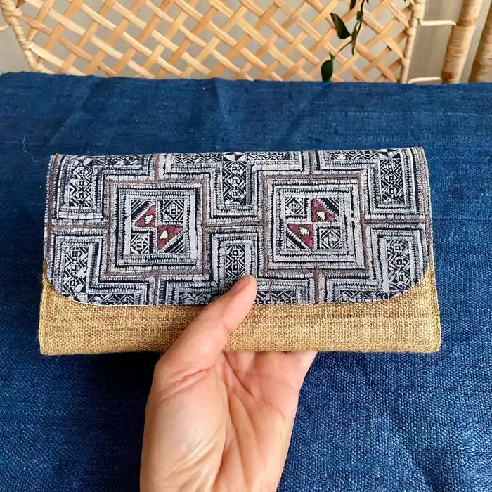 Vindigo long purse beige gray tribal front view hand holding