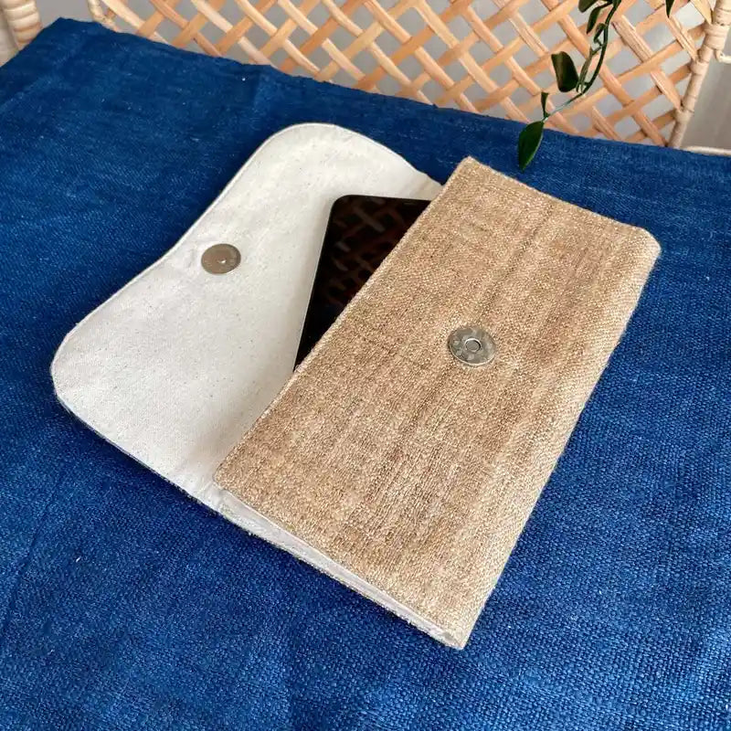 Vindigo long purse beige indigo embroidered lifestyle view with phone