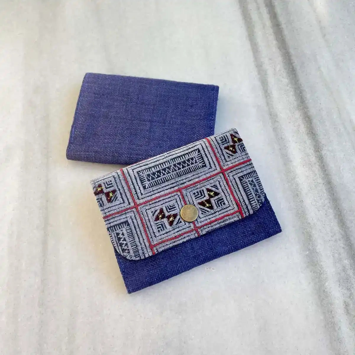 Vindigo wallet navy embroidered front angled view