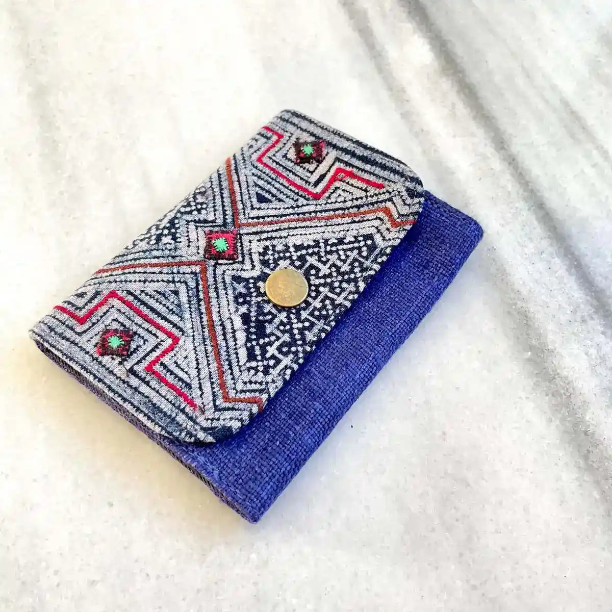 Vindigo wallet navy embroidered front angled close view
