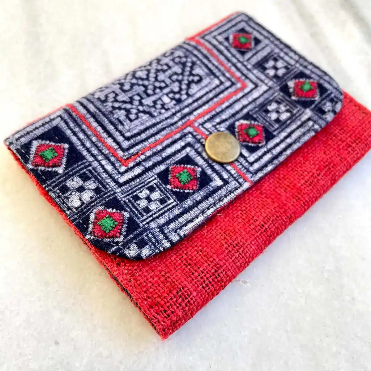 Vindigo wallet red embroidered angled embroidery close-up