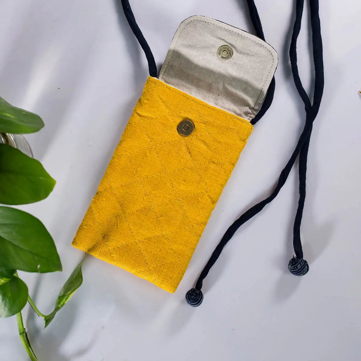 Open yellow hemp phone purse showing cotton lining