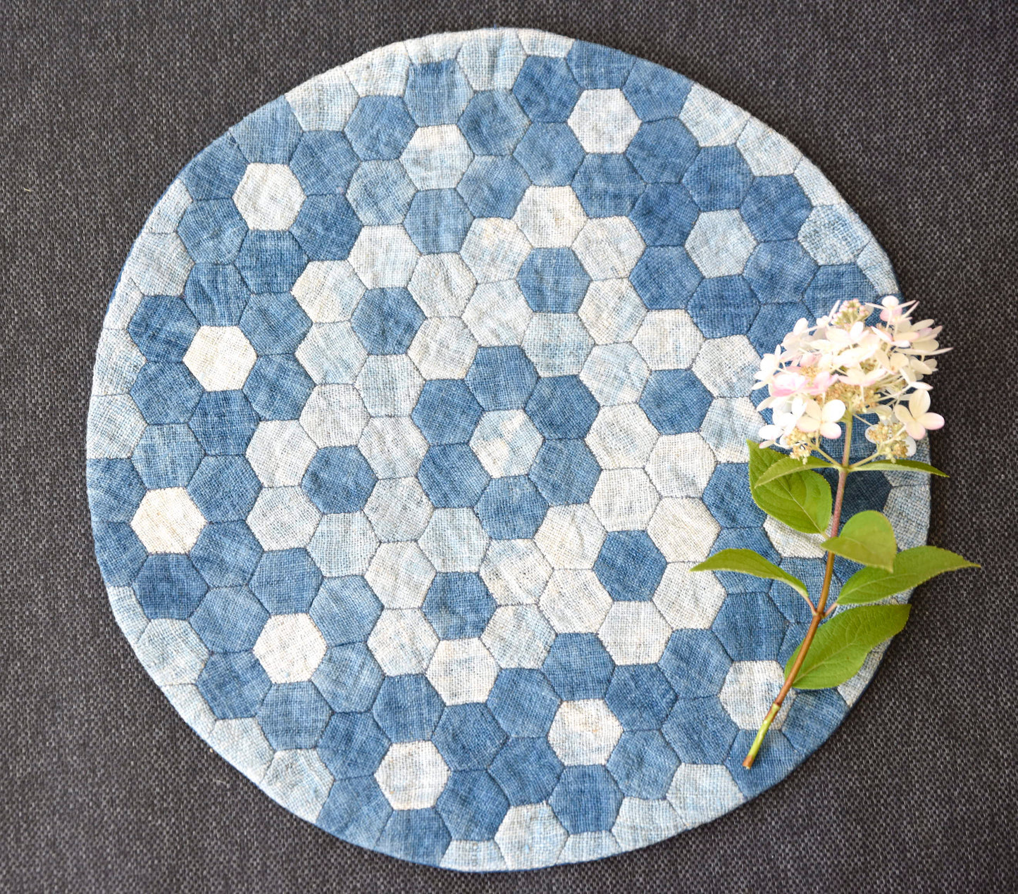 Unique quilted round placemat, hand-stitched, handwoven hemp fabrics, indigo dye