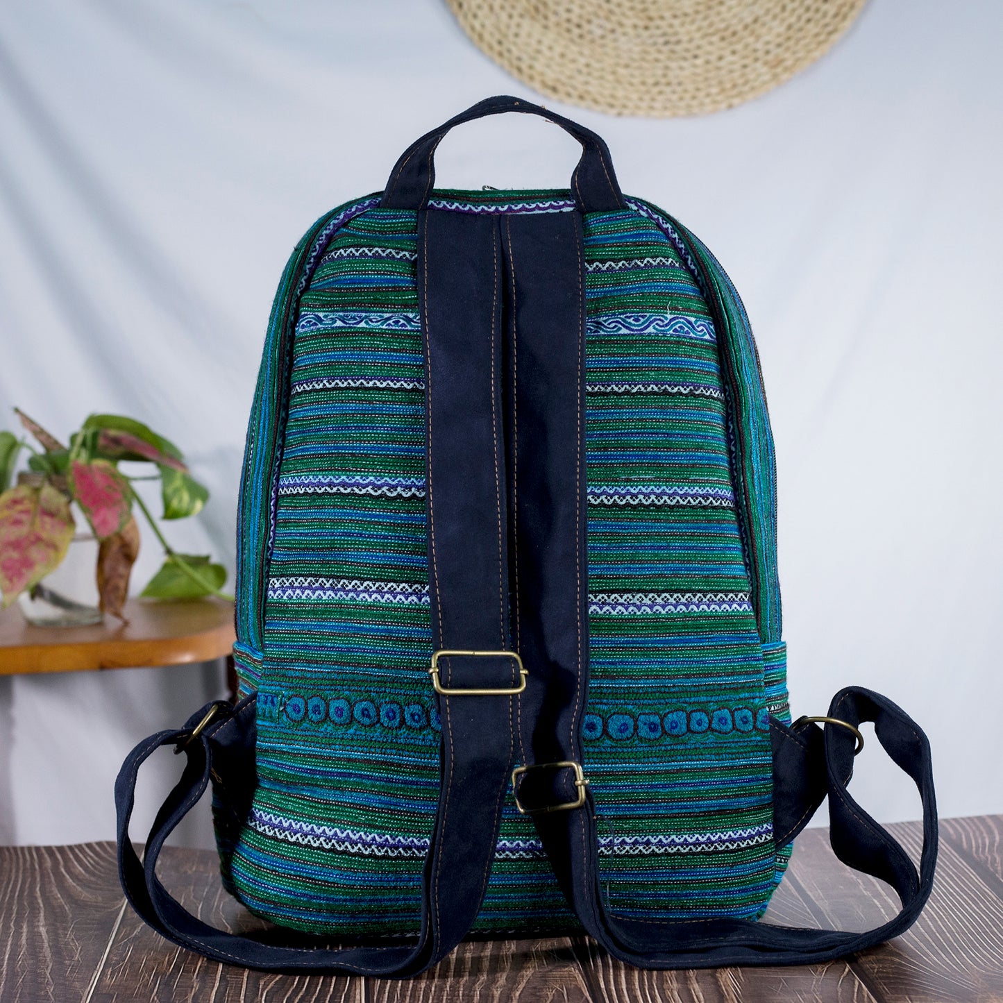 Big-sized backpack, round pocket in front, blue hand-embroidery fabric, black faux leather trim