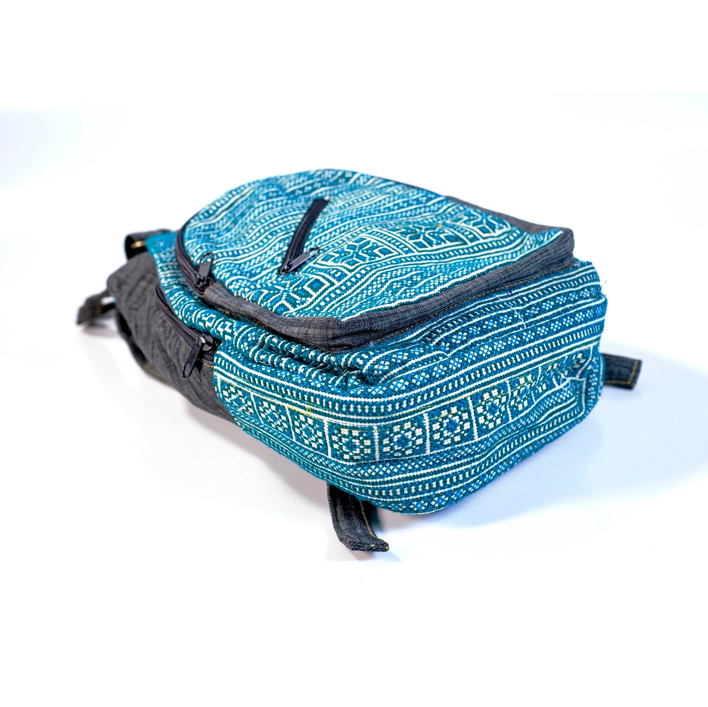 Multi-purpose backpack and sling, light blue hand-embroidery fabric, dark blue trim