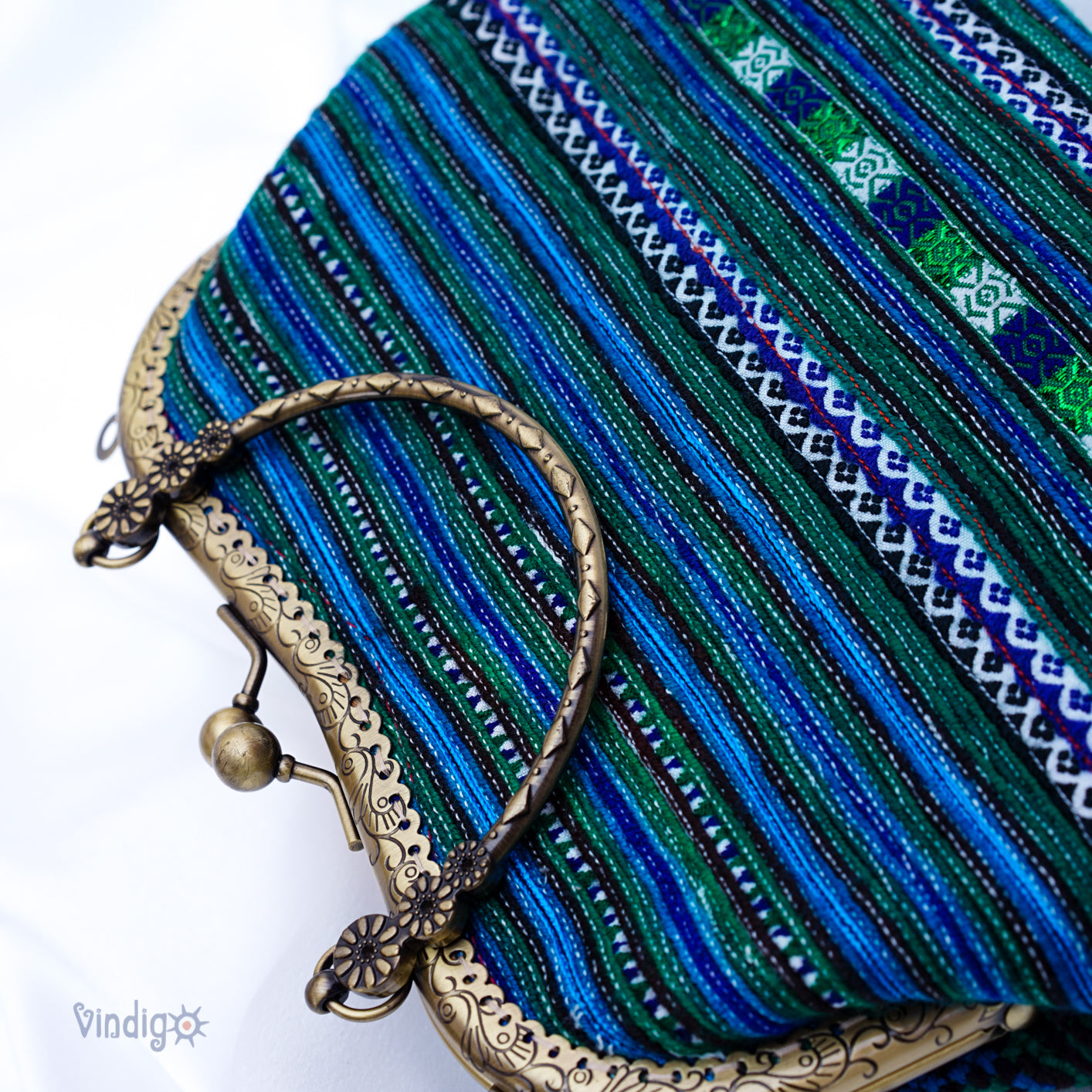 Unique blue embroidered pattern with copper-binding shoulder bag
