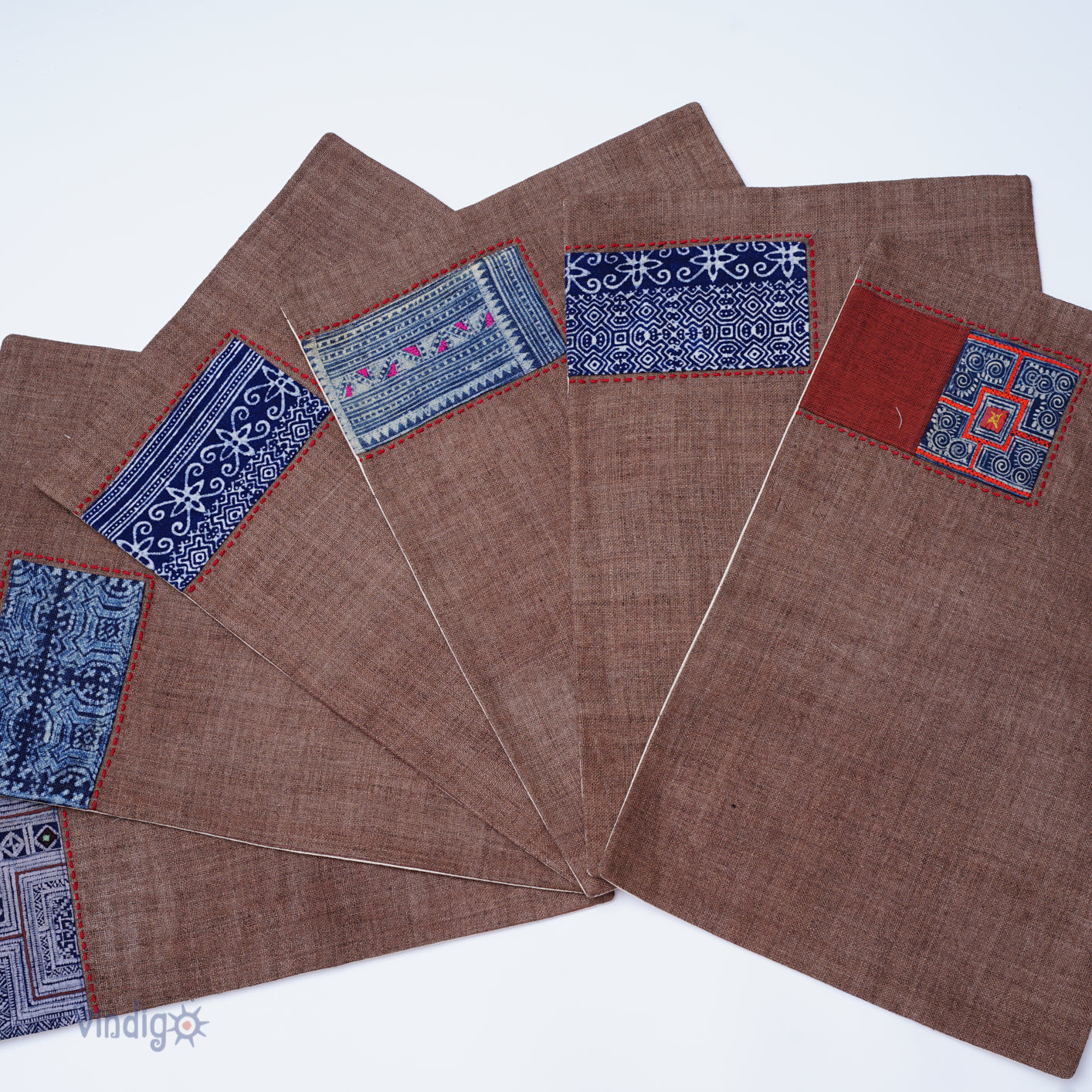 Dark brown hemp placemat, hand-embroidered patch, hand stitches