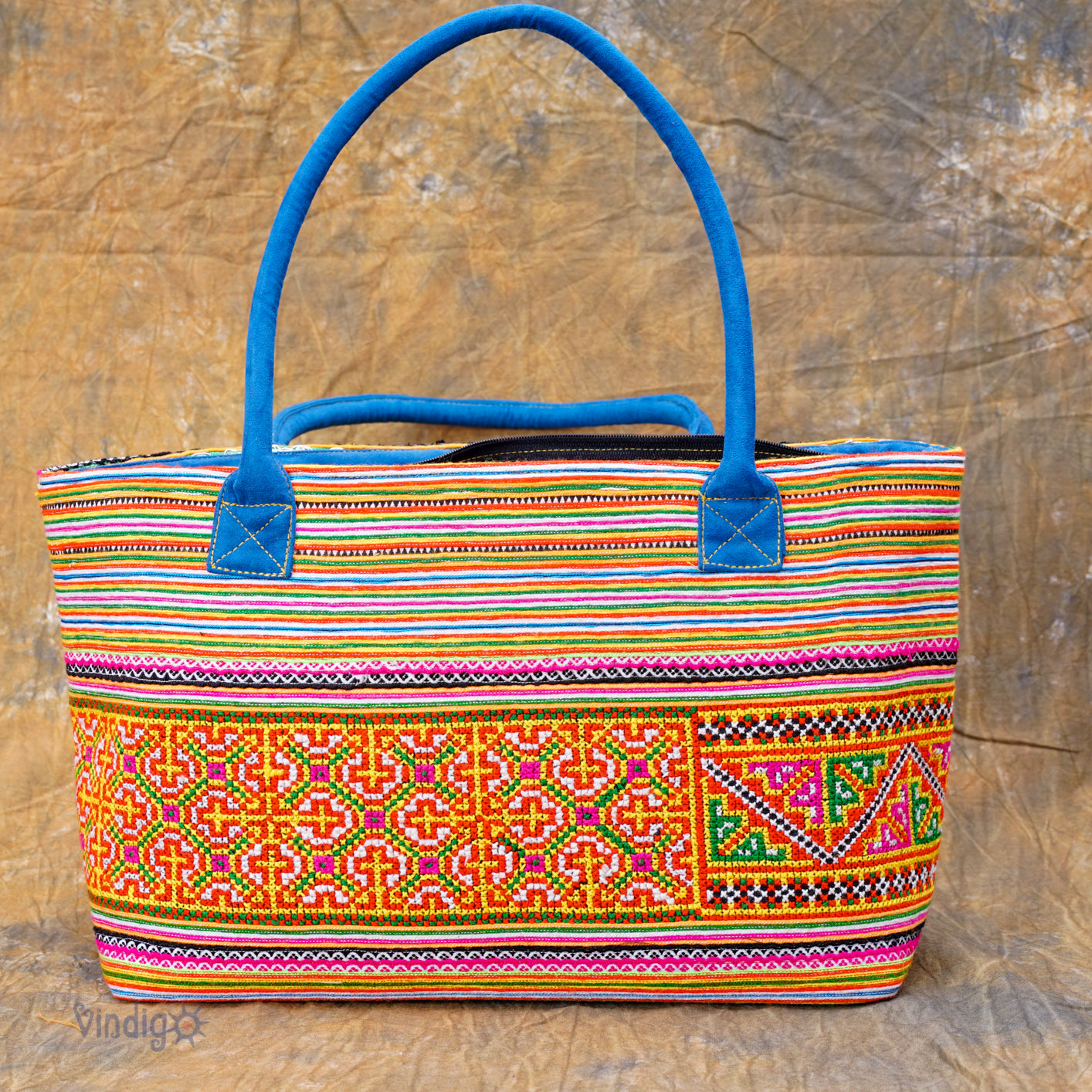 Orange rectangle form bag, hand-embroidered, tribal pattern